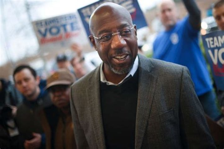 
Democrat Raphael Warnock Defeats Herschel Walker in High-Profile Georgia Senate Runoff Election 