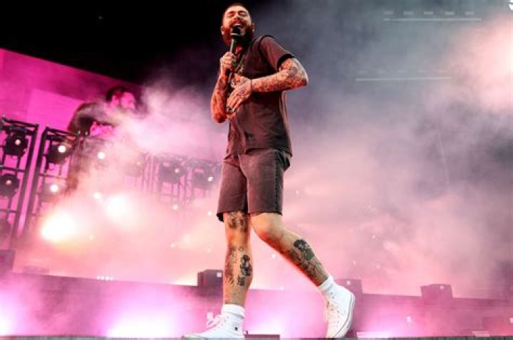 
Post Malone Postpones Boston Tour Stop After Being Hospitalized: ‘I Feel Horrible’ 