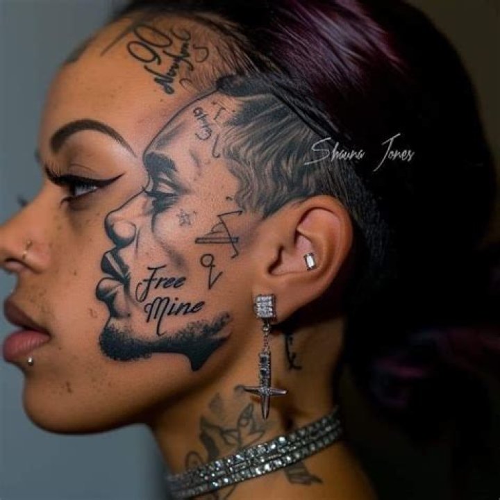 
“This one na ashabi”- Reactions as Lady tattoos Asake’s face on her body 