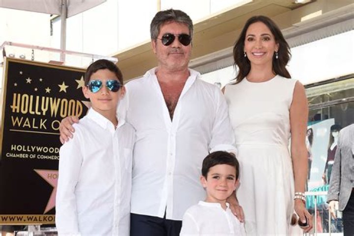 
Why Does AGT Judge Simon Cowell Have A Wrist Brace On? Hand Injury From Bike Crash 